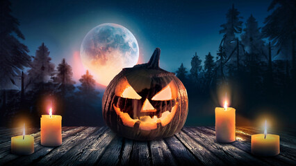 Wall Mural - Spooky Halloween Night with Glowing Jack-O'-Lantern Under a Full Moon