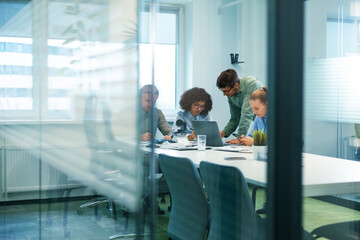 business office with blurred people casual wear, with blurred bokeh background