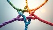 © NFTNexus - Connecting and unity teamwork concept as a business metaphor for forming a partnership of diversity with various ropes intertwined for collaboration and cooperative work.