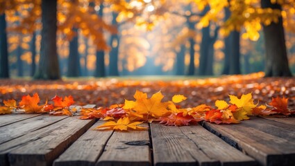 Poster - Empty wooden surface adorned with beautiful autumn leaves in a park.