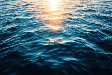 Wall Mural - glimmering water surface with sun reflection at twilight hour