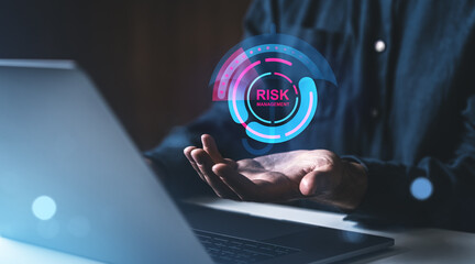Poster - Businessman managing risk with a futuristic interface.