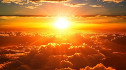 Poster - A spectacular sunrise unfolds, illuminating the sky with shades of gold and orange. The sun rises majestically above a sea of fluffy clouds, creating a serene and awe-inspiring moment