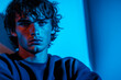 © Daniella - Portrait of Young Man in Blue Lighting