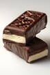 © imagemir - Two delicious chocolate-covered ice cream bars stacked, showcasing a creamy center and glossy exterior.