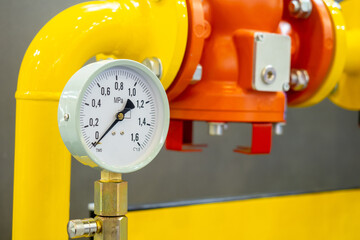 Poster - pressure gauge on gas pipe. yellow pipeline from industrial equipment. meter shows lack of pressure 