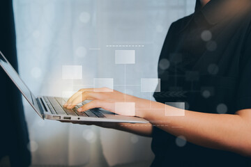 Poster - Hands Typing on Laptop with Digital Interface and Blurred Background in Soft Lighting, Business concept