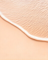 Wall Mural - gentle ocean wave lapping on a beige beach