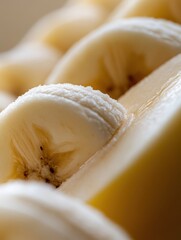 Leinwandbilder - Sliced banana halves showcasing detailed texture against a softly blurred background