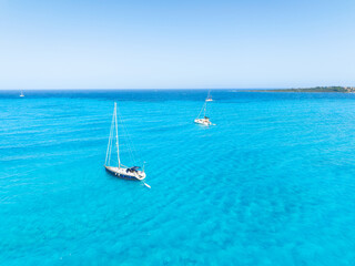 Wall Mural - drone view of a sailing yacht. vacationing people. summer time for sea travel. vacation and holidays