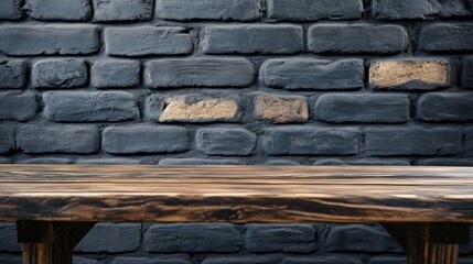 Poster - A beautifully crafted empty brown wooden table sits in front of a dark brick wall, showcasing its rustic charm