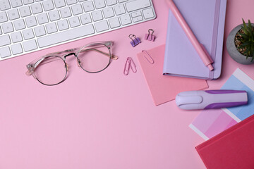 Aufkleber - Designer's workplace with keyboard and stationery on pink background, flat lay. Space for text