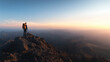 © Kittapud Janpirom - Travel and Adventure: A solo traveler standing atop a mountain peak, overlooking a vast landscape during golden hour, capturing the essence of exploration
