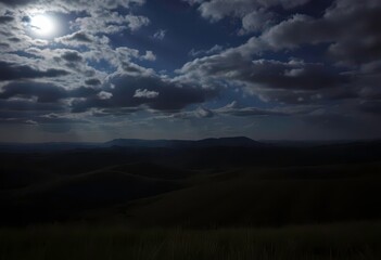 Wall Mural - Serene night landscape, moonbeams illuminate rolling hills beneath a cloudy sky,  shadow, magical