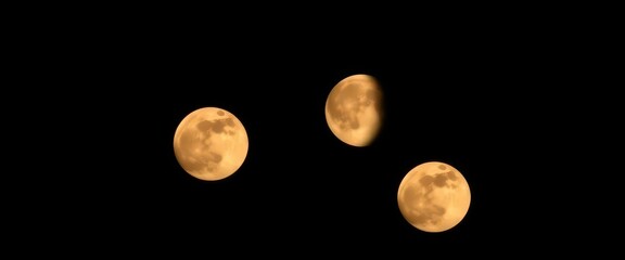 Wall Mural - Three full moons, celestial triple moon, night sky phenomenon, surreal, phases of the moon