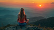 © Pakhnyushchyy - woman meditating on the mountains on the sunrise