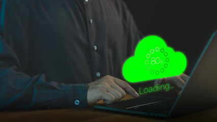 Poster - Person using a laptop computer with a glowing green cloud upload icon and loading progress bar, representing cloud computing, data transfer, internet of things, and digital technology.