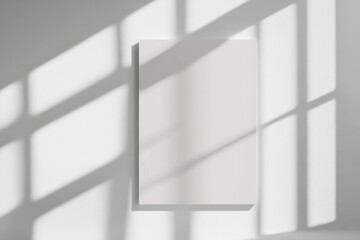 Aufkleber - Blank white poster frame on a white wall in a minimalistic setup with soft shadows and light reflections