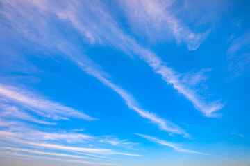 Wall Mural - blue sky and line of white clouds.