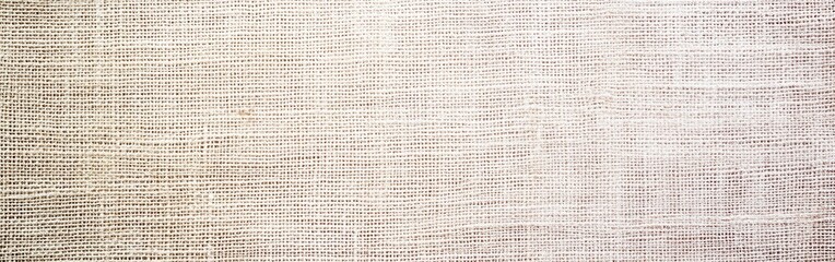 Poster - Burlap texture in soft pastel hues providing a rustic backdrop for various design projects and crafts
