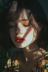 Poster - A close-up portrait of a woman with her eyes shut, expression calm