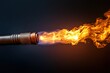 © MrHamster - A metal torch projecting bright orange and blue flames dramatically outward