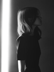 Aufkleber - A woman standing in front of a wall