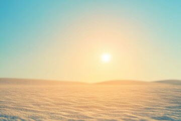 Poster - A serene sunset scene over sandy dunes with a vast horizon