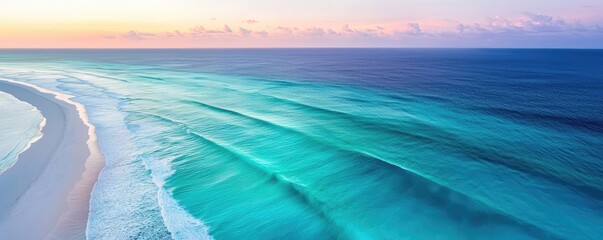 Poster - Aerial landscape abstract background idea. A serene ocean view at sunset with gentle waves and vibrant colors reflecting in water.