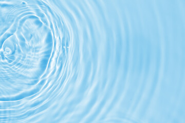 Wall Mural - abstract transparent water shadow surface texture natural ripple on blue background