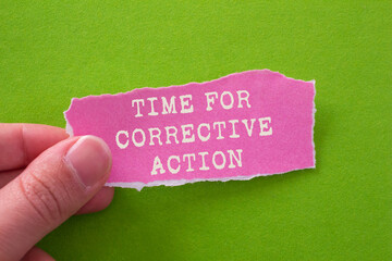 Leinwandbilder - Time for corrective action message written on ripped torn pink paper piece on green background. Conceptual time for corrective action symbol. Copy space.