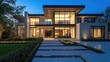 © Gambar Upi - Modern two story luxury residence with illuminated exterior and landscape