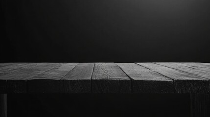 Aufkleber - The rustic wooden table features a rough surface, emphasizing the natural texture and grain, contrasting beautifully with a softly lit black background, inviting artistic expression