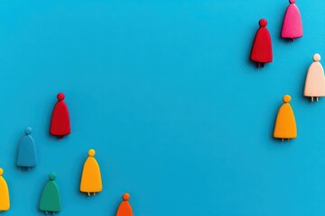 Poster - Colorful group of wooden figures displayed together representing diversity, creativity, and fun in artistic expression