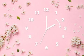 Poster - Clock and flowers on pink background, top view. Arrow showing time change one hour ahead in spring. Daylight saving time