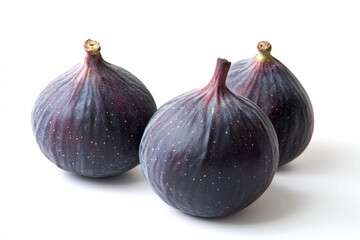 Poster - Three fresh figs sit together on a clean white surface, waiting to be eaten or used in a recipe
