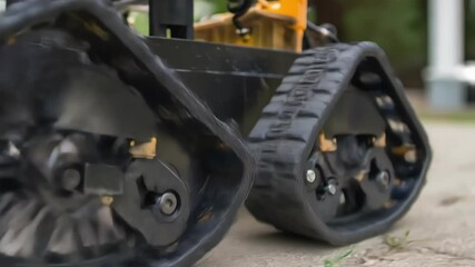 Aufkleber - Innovative exploration robot showcasing its robust tank like treads traversing a concrete surface, demonstrating mobility and advanced technology for traversing challenging terrains