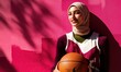 © Maria Zamchiy  - Young dark skinned woman wearing hijab with ball in her hands, female basketball player, sport girl portrait, diversity and equality concept, AI generated
