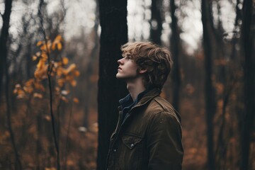 Poster - A person standing in a forest, gazing upwards
