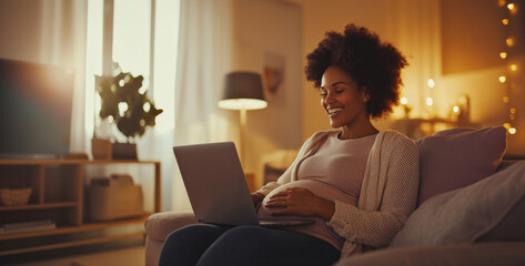 Aufkleber - A pregnant woman is sitting on a comfortable sofa in a softly lit living room, happily using her laptop. It is evening, and warm light filters through the windows, creating a cozy atmosphere.
