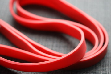 Poster - Red rubber tape for training.