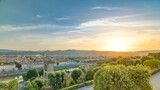 Sunrise top view of Florence city timelapse with arno river bridges and historical buildings