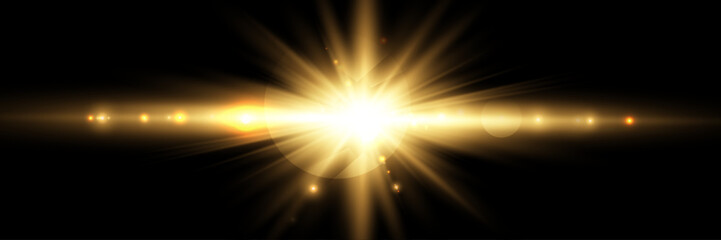 Wall Mural - golden light burst with lens flare on black background