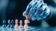 © Sengphachanh25 - Robotic hand moves chess piece on a dark board. Digital blue light highlights the robotic hand. Strategy game concept