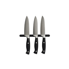 chef knives on magnetic strip: three chef knives with black handles are attached to a magnetic knife