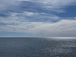 Wall Mural - beautiful sea and sky with soft clouds.