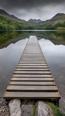 Wall Mural - Tranquil lake with wooden pier and mountain reflections under overcast sky