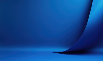 Fototapete - A blue background with a blue paper that is folded into a curve