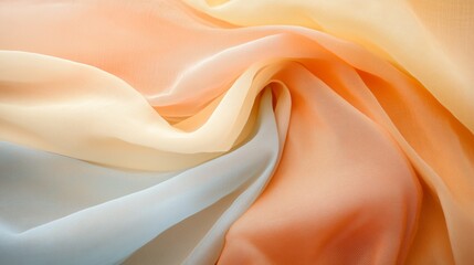 Poster - Soft flowing fabric showcasing delicate hues of peach, cream, and light blue with intricate texture