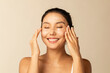© McKinsey Jordan/Stocksy - Woman Enjoys Giving Herself a Face Cleansing